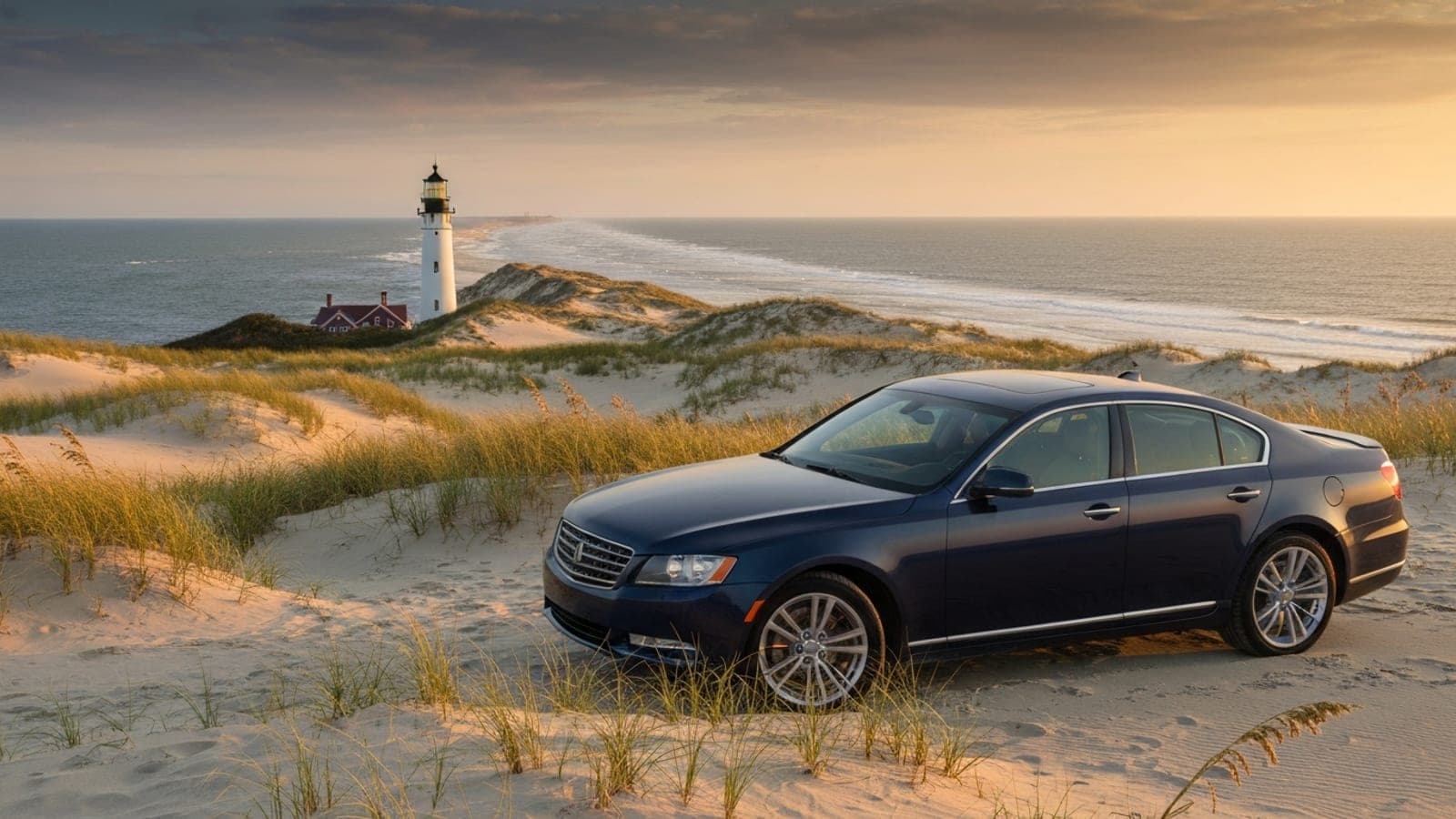 Editorial photograph of the Cape Henry Lighthouse on the coastal Virginia Atlantic shoreline at golden hour with sand dunes and sea oats in the foreground.